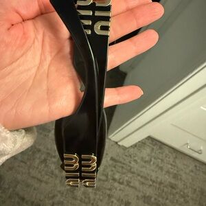 Black Sunglasses with Gold Lettering